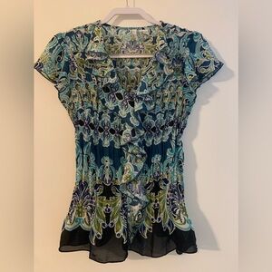 Sleeveless button-down blouse